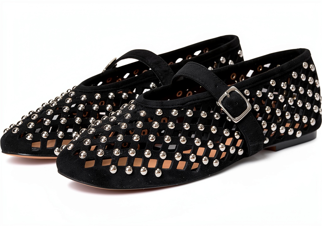 Black Stud shoes displayed on a neutral background highlighting the stud design
